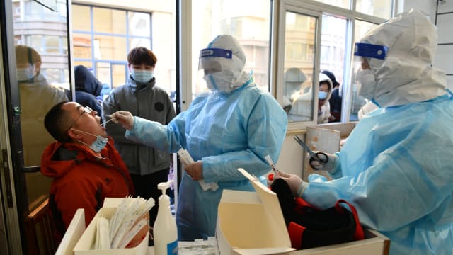 中国新增1666起病例 33市封城抗疫