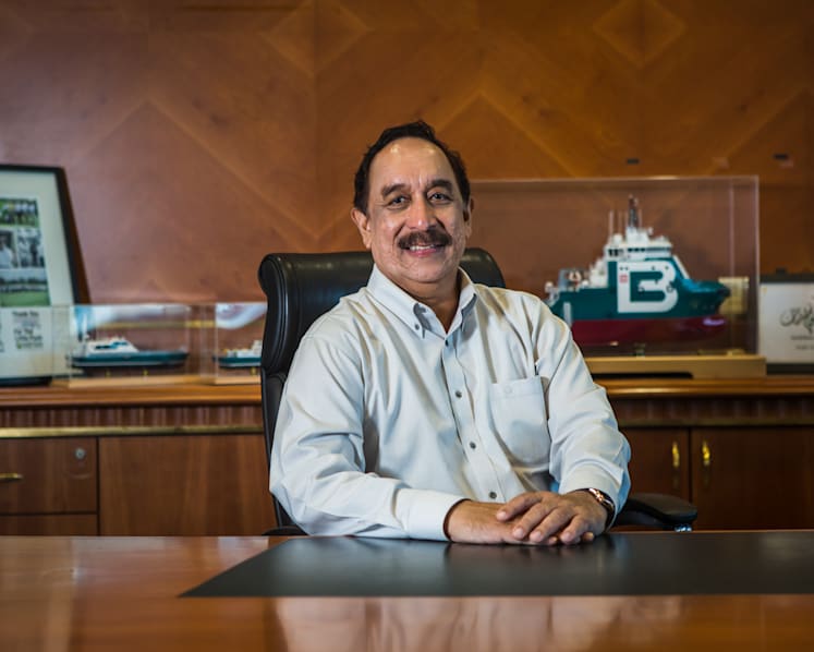 From grass-cutter, janitor to shipping bigwig — President next?
