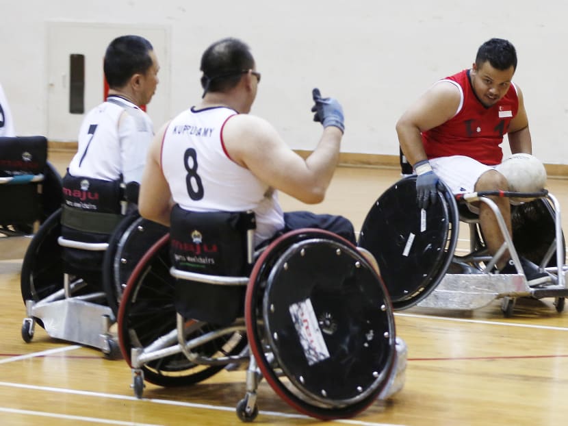 Singapore wheelchair rugby athletes at home in rough sport