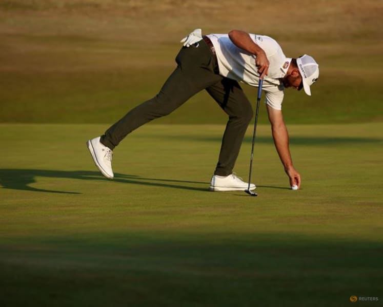 Burns seizes Open lead, DeChambeau shrugs off penalty to stay in the mix