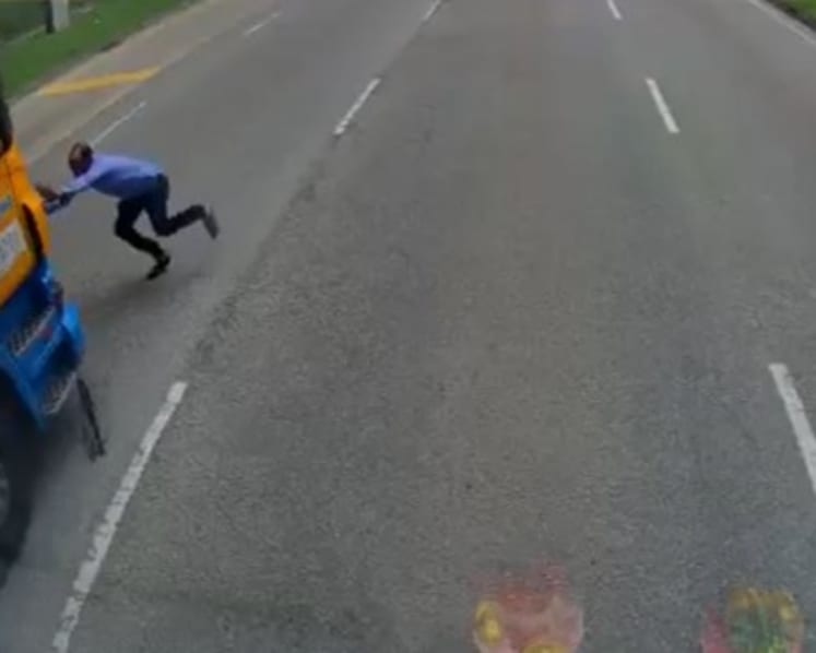 Pedestrian, 33, taken to hospital after trailer truck hits him in Tuas