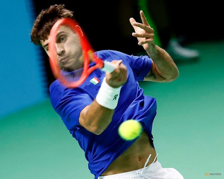 Battling Cobolli sends holders Italy into Davis Cup final