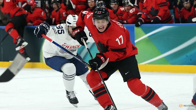 Ice hockey-Canada thrash France 10-2, Swiss top Czechs in OT, Denmark down Latvia