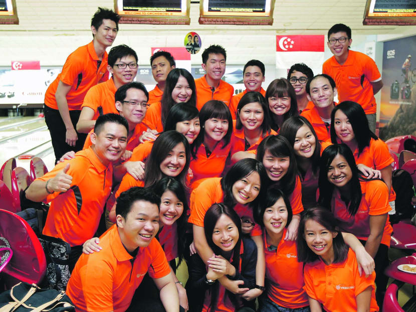 Staff of Verztec Consulting Pte Ltd at Canon Super Series 5 (2013). Photo: Wee Teck Hian