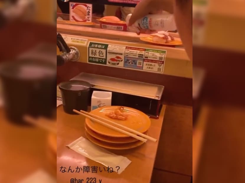 #trending: Japan's viral 'sushi terrorism' trend strikes again as prankster sprays disinfectant on food #trending: Japan's viral 'sushi terrorism' trend strikes again as prankster sprays disinfectant on food