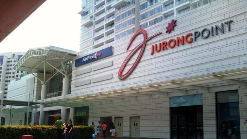 Jail for unlicensed money changer who pinned down client at Jurong Point mall to help steal S$30,000 Jail for unlicensed money changer who pinned down client at Jurong Point mall to help steal S$30,000
