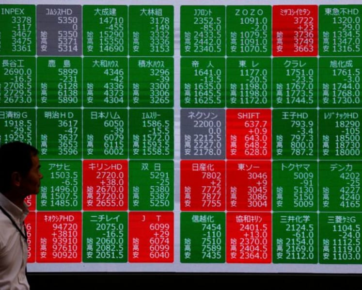 Japan's Nikkei clocks best quarter on record on tech rebound