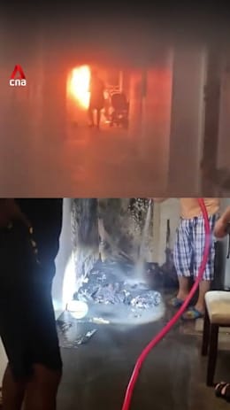 Residents put out fire outside Woodlands HDB flat