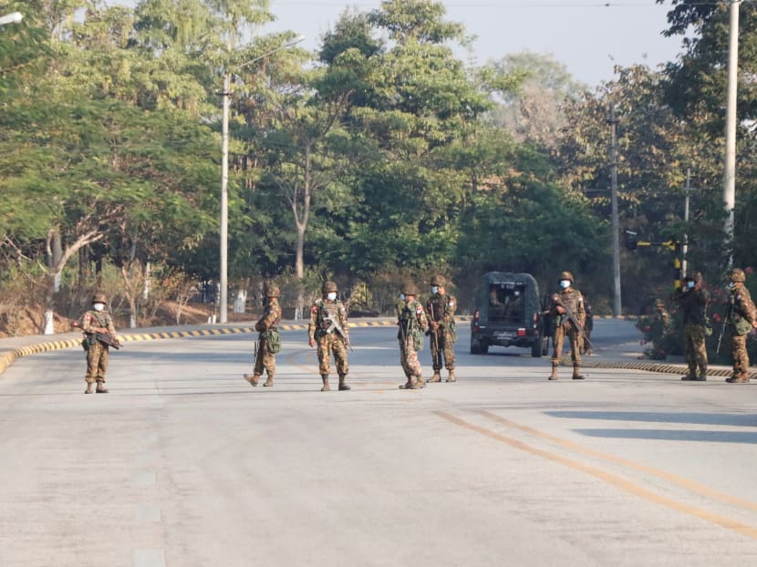 Soldiers stand guard at a Myanmar's military checkpoint on the way to the congress compound in Naypyitaw, Myanmar on Feb 1, 2021.