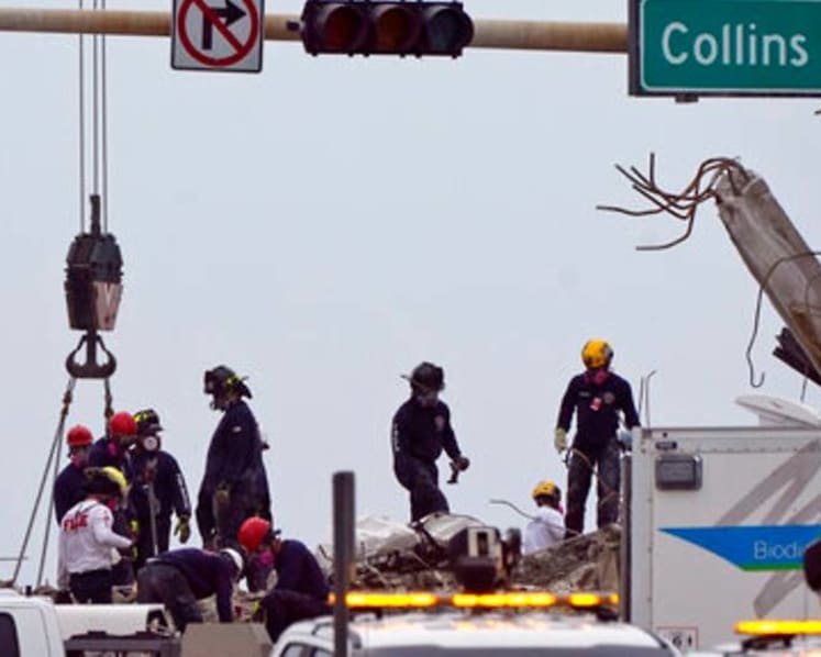 Searchers at Florida condominium collapse site 'not seeing anything positive'