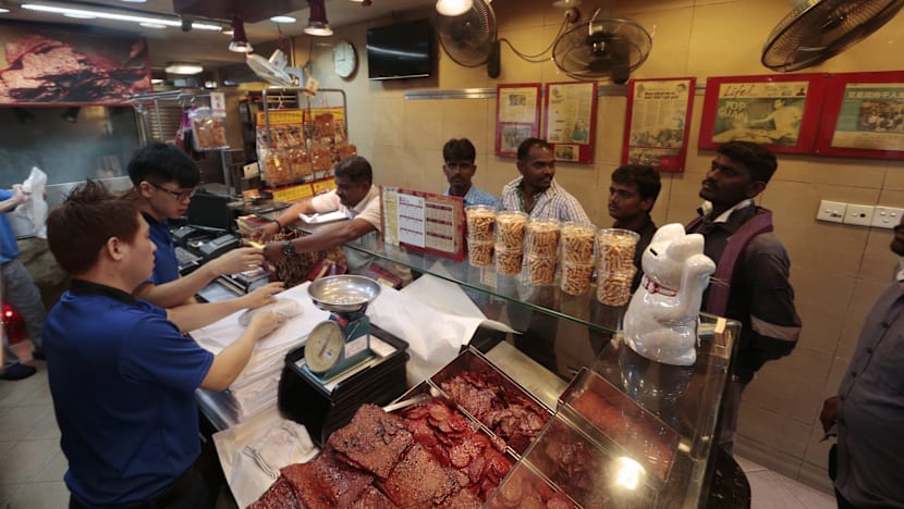 For S$5 an hour, migrant workers queue overnight for bak kwa