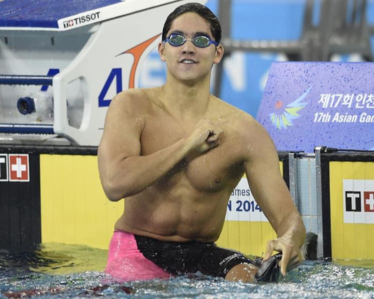 Schooling tops Phelps in 100m fly