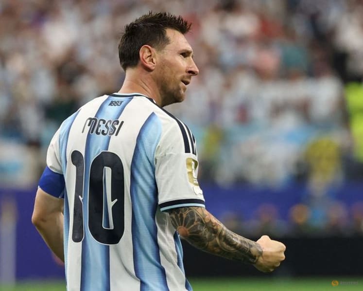 'Tired' Messi savours record night as Argentina march on