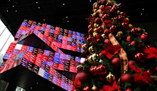 Asian markets mostly up after US growth fuels Wall Street record