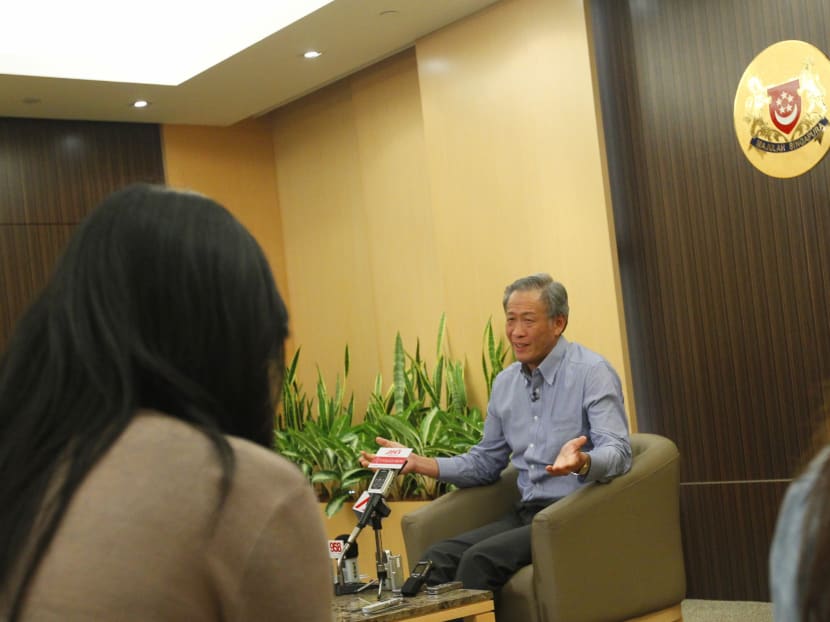 Minister for Defence and Chairman of the Haze Inter-Ministerial Committee (HIMC) Dr Ng Eng Hen giving an interview to local media on 5 July 2013, update on the outcome and discussions of the HIMC..Photo: Ernest Chua.