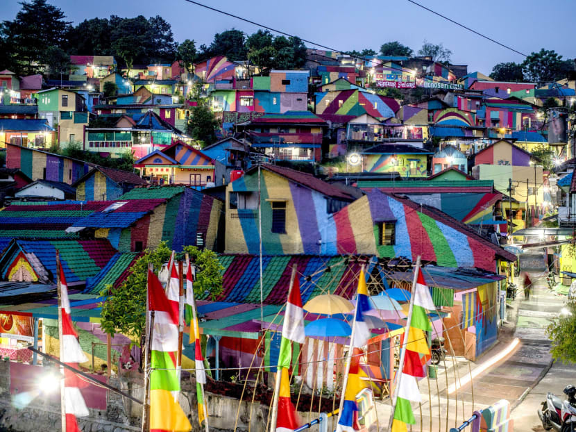 This picture taken on May 23, 2017 shows an Indonesian hamlet dubbed "the rainbow village" in Semarang, central Java, that has become an internet sensation and attracting hordes of visitors. Photo: AFP