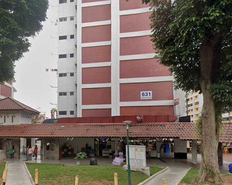 Woman charged with causing husband's death in scuffle, says he injured himself