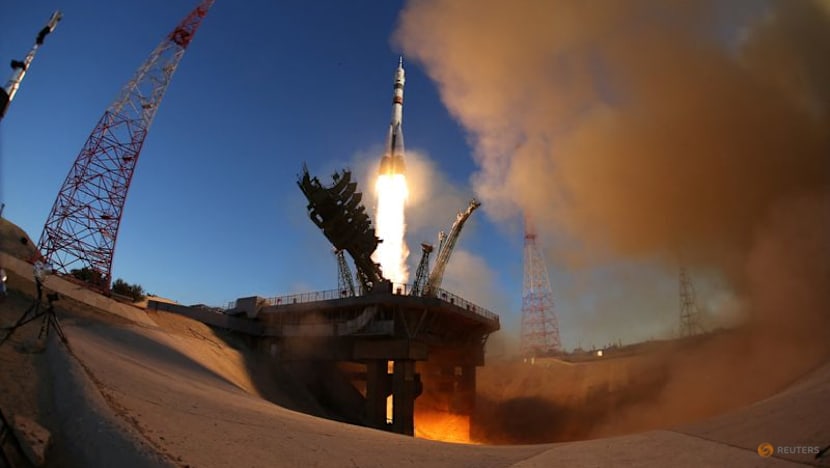 Russia sends American and two cosmonauts to space station with rare NASA chief visit