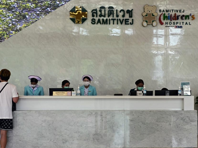 Hospital personnel work on a registration desk at Samitivej Srinakarin Hospital in Bangkok on May 22, 2024. Hospital personnel work on a registration desk at Samitivej Srinakarin Hospital in Bangkok on May 22, 2024.