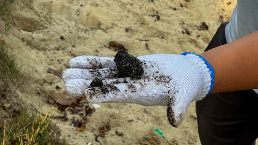 Singapore oil spill beach clean-up progressing 'faster than expected'