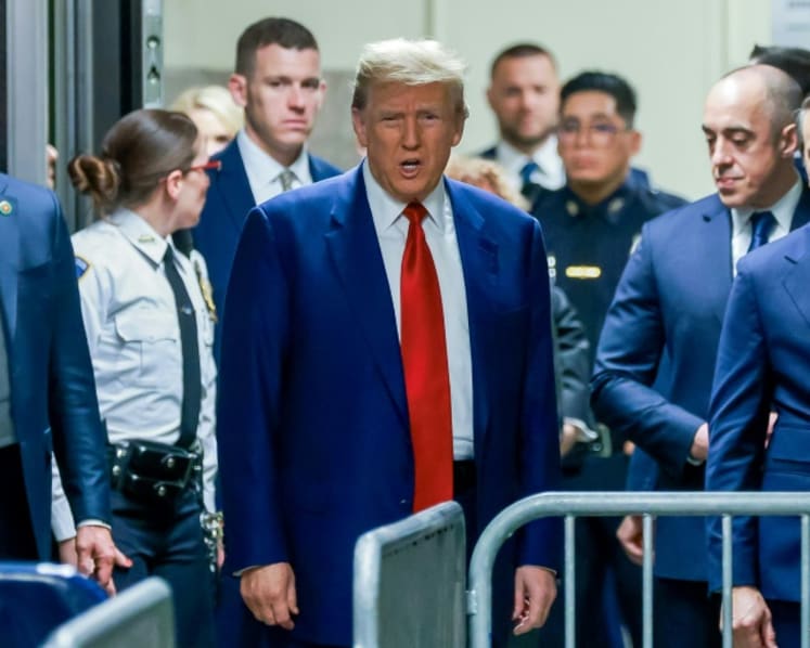 Judge issues gag order barring Donald Trump from commenting on witnesses, others in hush money case