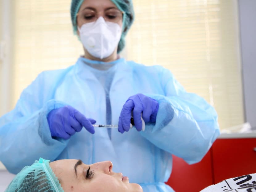 Dermatologist Brunilda Bardhi applies aesthetic treatment to a woman at a clinic in Tirana on February 4, 2021. Dermatologist Brunilda Bardhi applies aesthetic treatment to a woman at a clinic in Tirana on February 4, 2021.