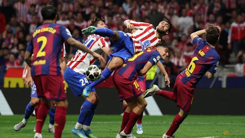 Atletico survive Barca scare to reach first Champions League semi in nine years