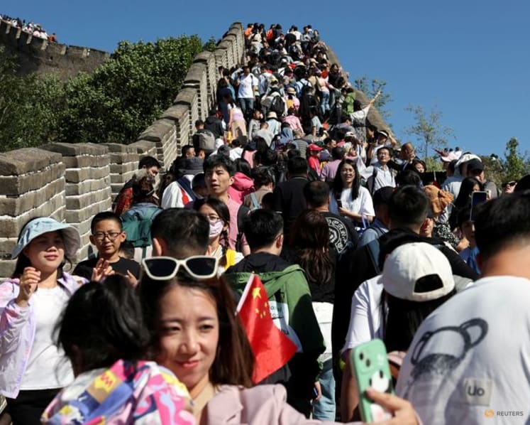 As China’s Golden Week begins, its ‘tiaoxiu’ policy dulls holiday glow for some. Is it time for change?