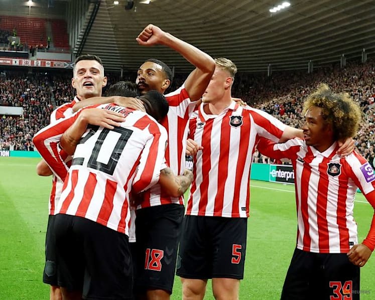 Benfica earn win in Milan as Sunderland celebrate historic night