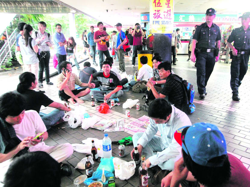 Thai nationals at Golden Mile Complex. The COI noted the concentration of services in congregation areas made it easier for foreign workers 
to run errands. Today file photo