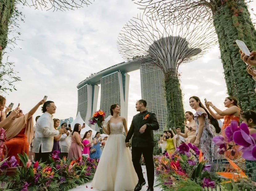 A Filipino couple's wedding at Gardens by the Bay (pictured) was inspired by a scene from the Crazy Rich Asians movie. A Filipino couple's wedding at Gardens by the Bay (pictured) was inspired by a scene from the Crazy Rich Asians movie.