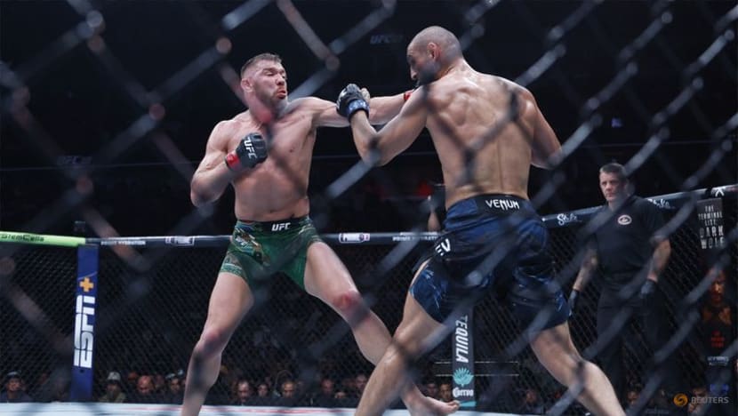Relentless Chimaev beats du Plessis to win UFC middleweight title