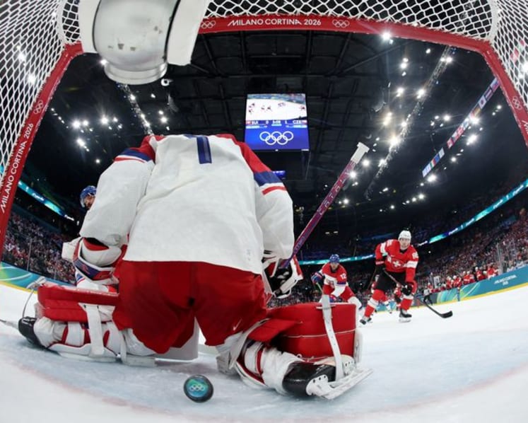 Ice hockey-Canada thrash France 10-2, Swiss top Czechs in OT, Denmark down Latvia