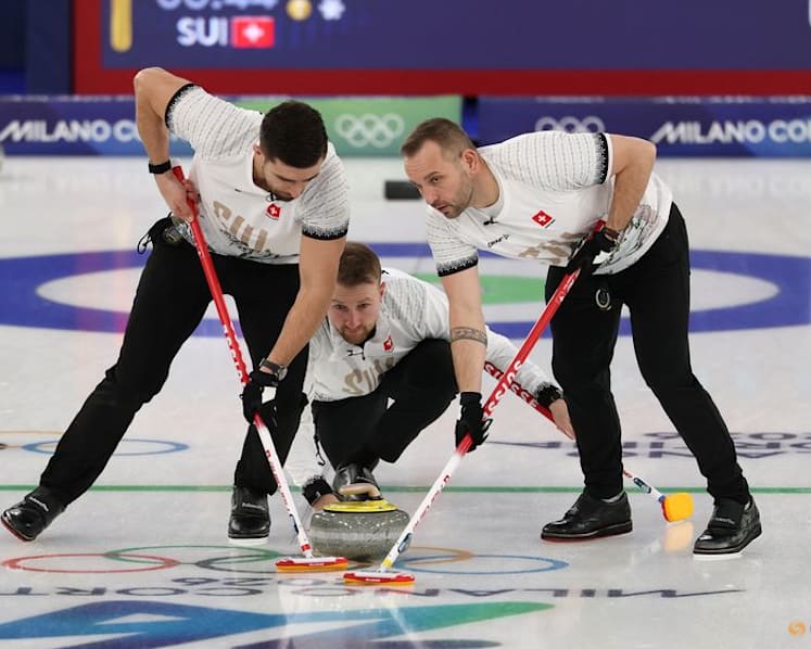 Curling-Switzerland's Schwaller following in father's footsteps at Winter Games