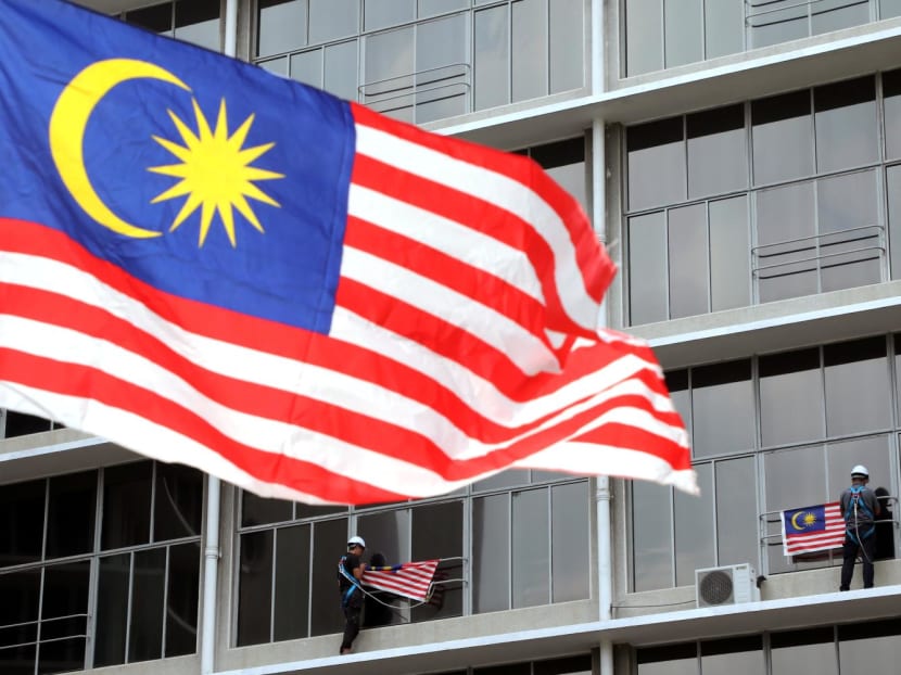 Workers hang Malaysian flags ahead of celebrations for the country’s 62nd anniversary of independence on August 31 in Kuala Lumpur, Malaysia on July 31, 2019. Workers hang Malaysian flags ahead of celebrations for the country’s 62nd anniversary of independence on August 31 in Kuala Lumpur, Malaysia on July 31, 2019.
