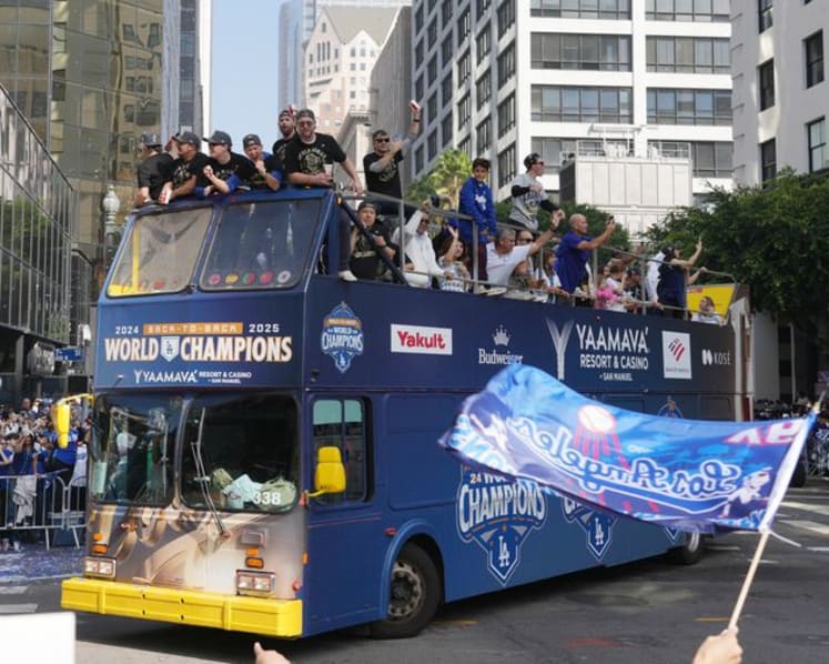 Baseball-Ohtani teases 'three-peat' as Dodgers parade draws Los Angeles crowds