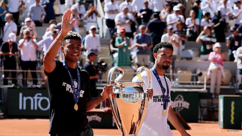 PSG players celebrate Champions League back-to-back titles with French Open crowd