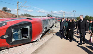 Royals visit deadly train crash site as Spain mourns