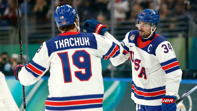 Ice hockey-Canada blank Czechs, US overpower Latvia, wins for Swiss and Germany