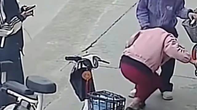 扶摔倒女子 中国女学生反被索赔22万人民币